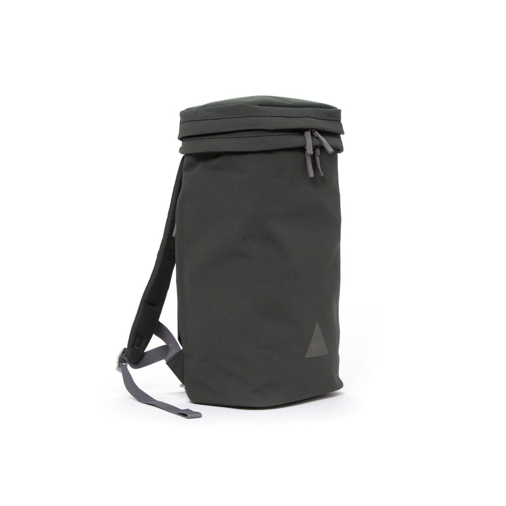 Grey canvas backpack with padded shoulder straps and triangle logo.