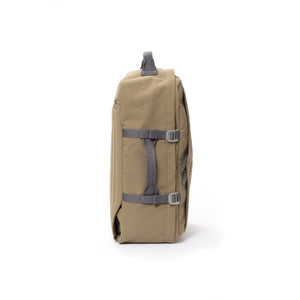 Khaki recycled canvas travel backpack with compression side straps.