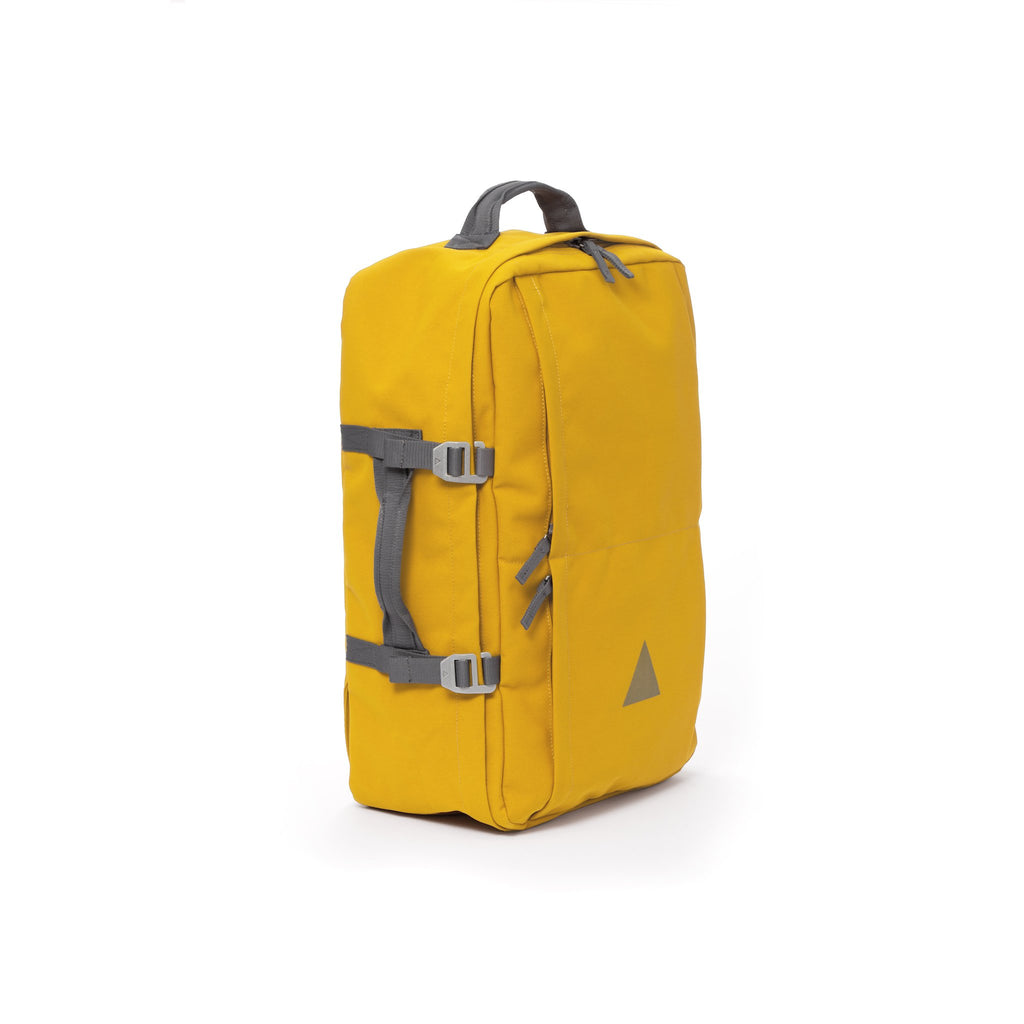 Yellow recycled canvas travel backpack with carry handle.