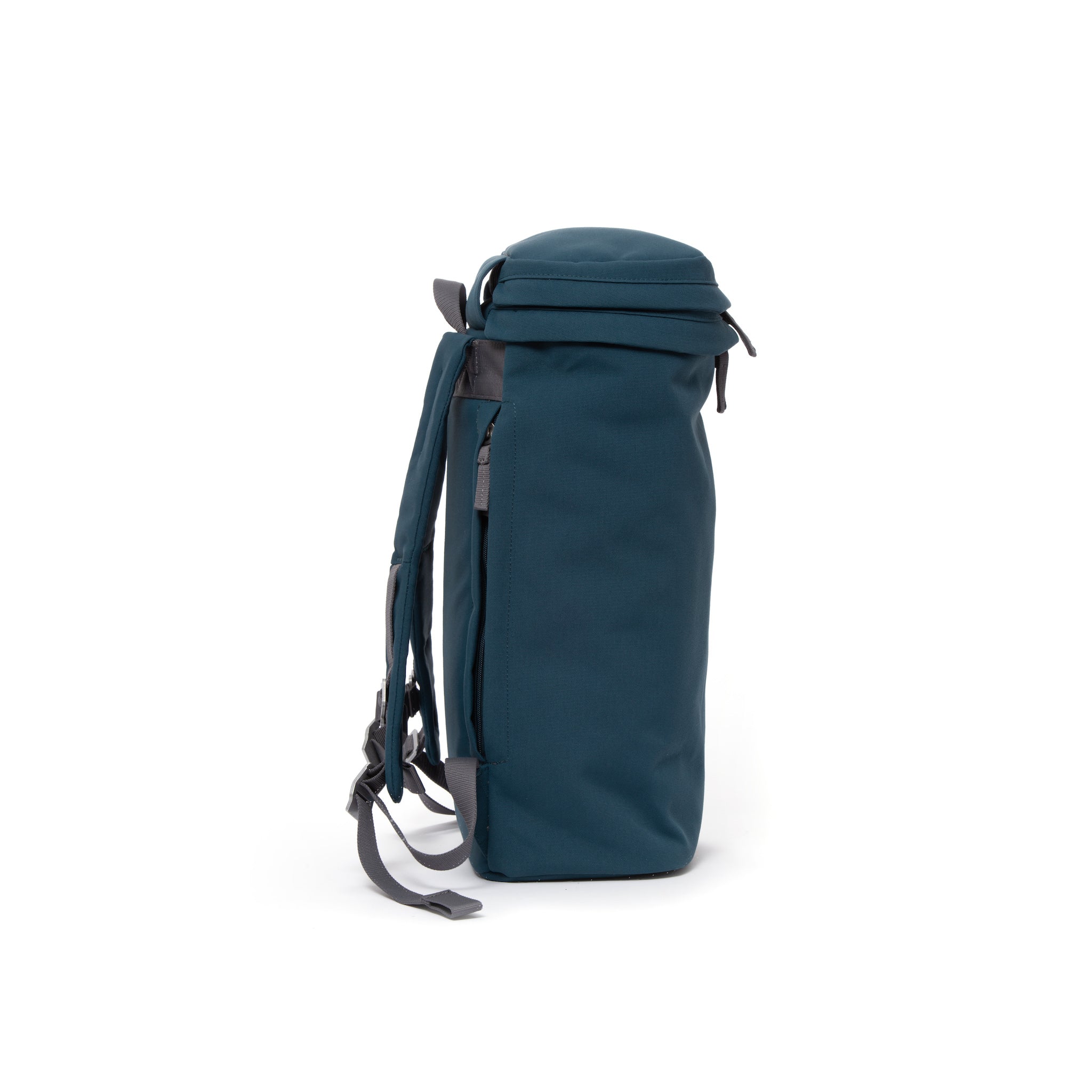 Blue canvas backpack with top zip pocket.