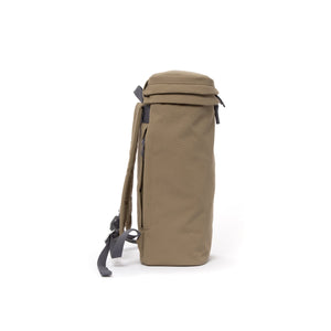 Khaki canvas backpack with top zip pocket.