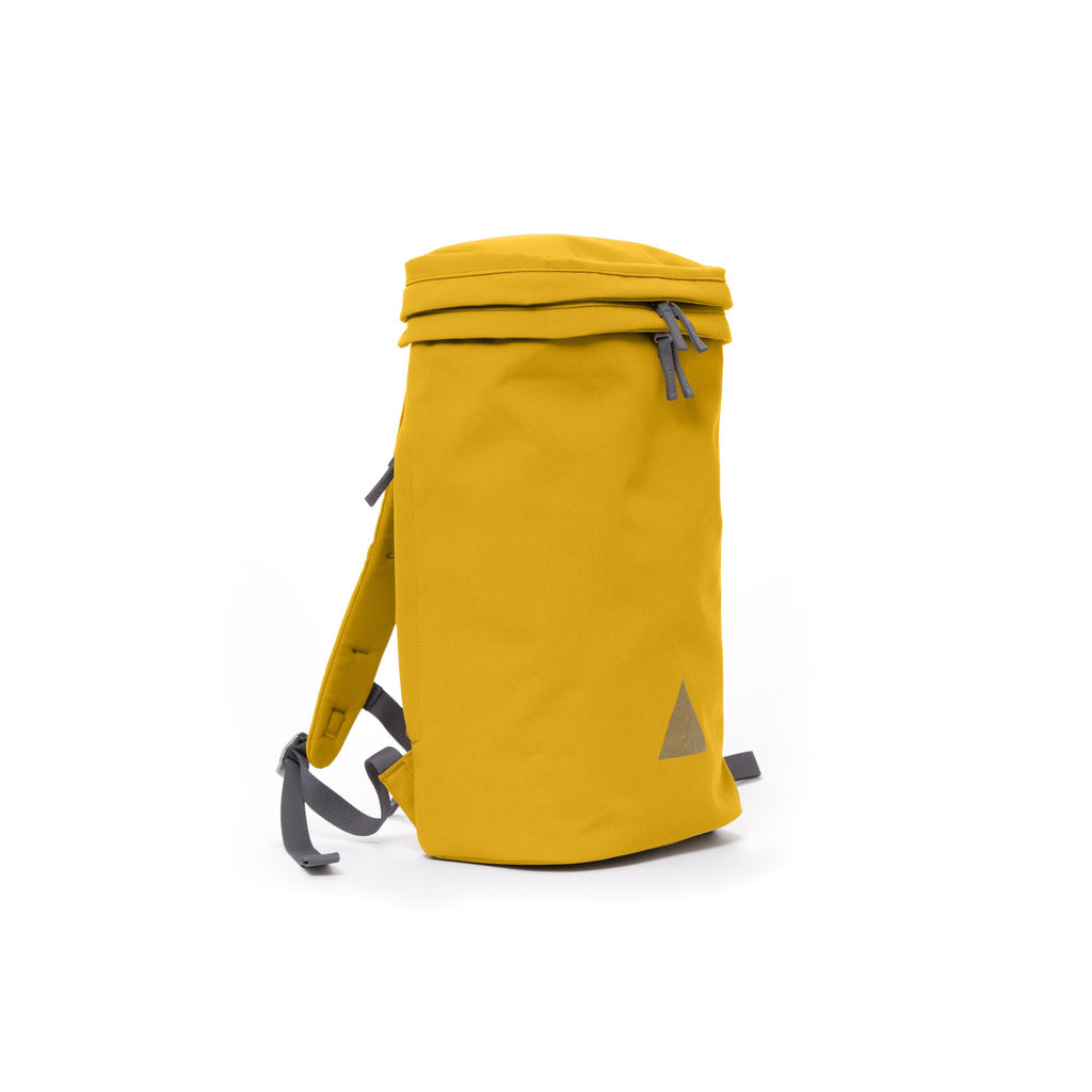 Yellow canvas backpack with padded shoulder straps and triangle logo.