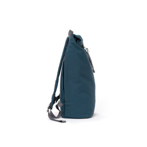 Blue waterproof canvas men’s rolltop backpack.
