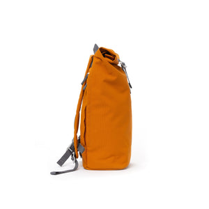 Orange waterproof canvas men’s rolltop backpack.