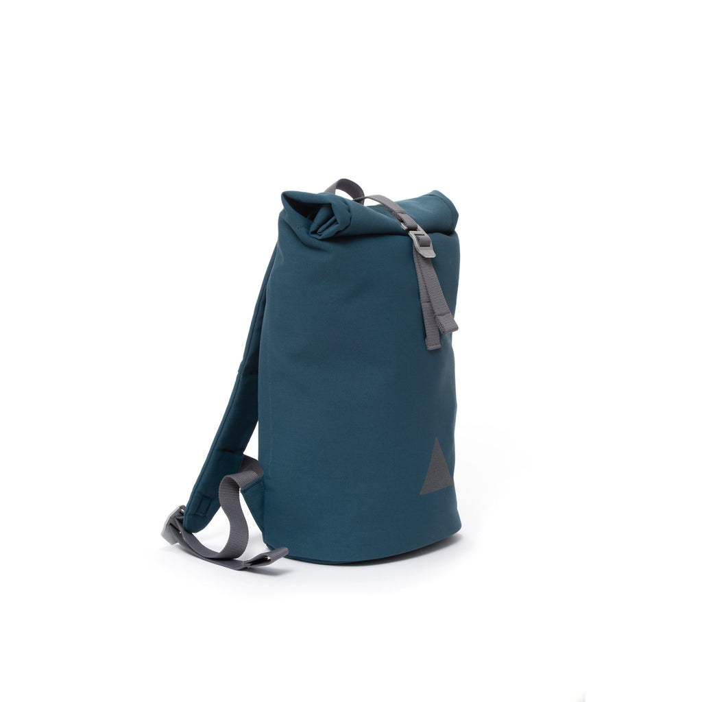 Blue recycled canvas women’s rolltop backpack.