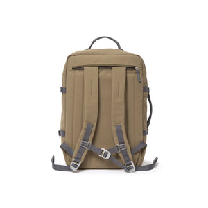 Khaki travel backpack with padded shoulder straps.