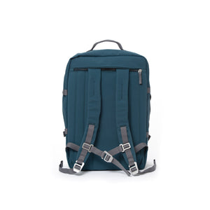Blue travel backpack with padded shoulder straps.