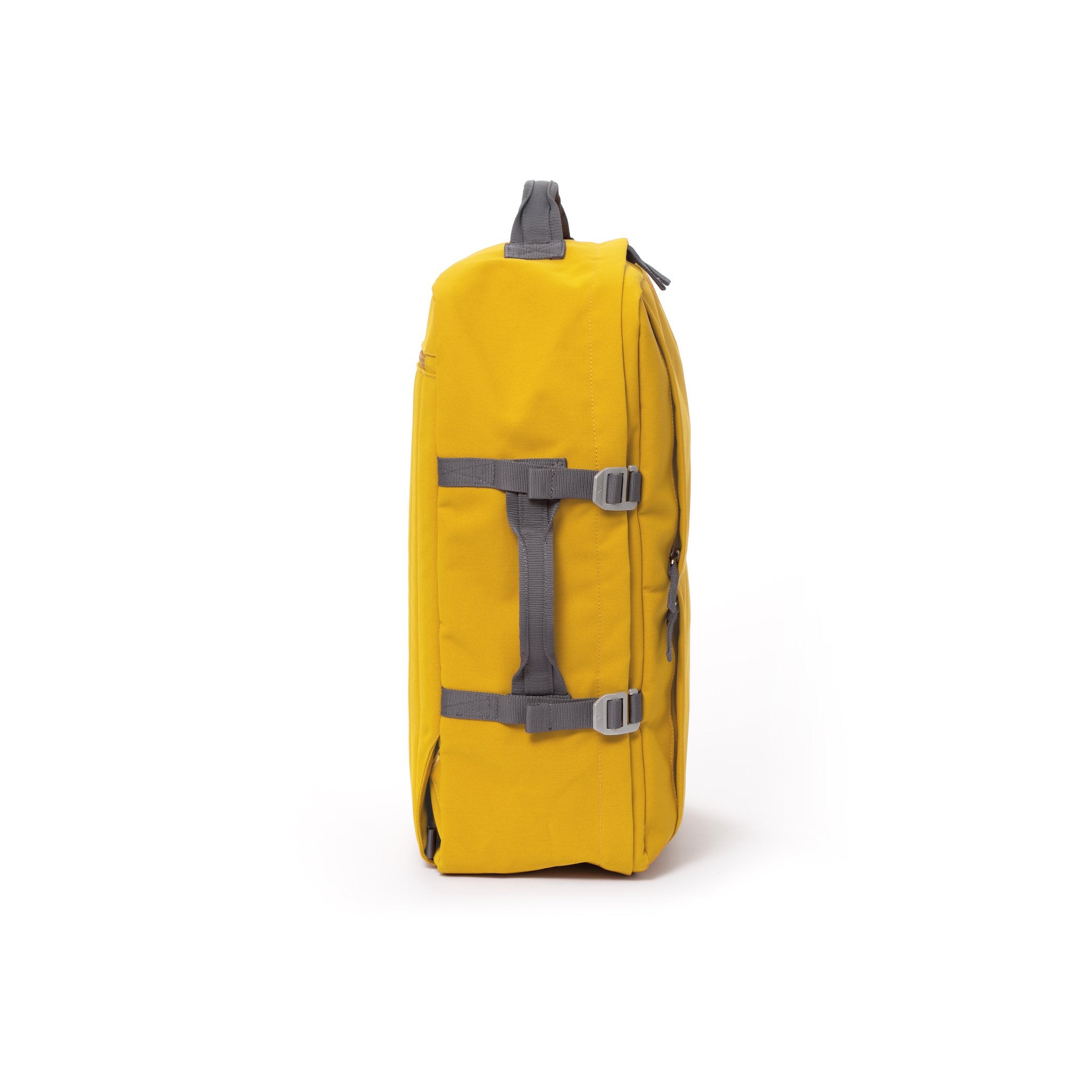 Yellow recycled canvas travel backpack with compression side straps.