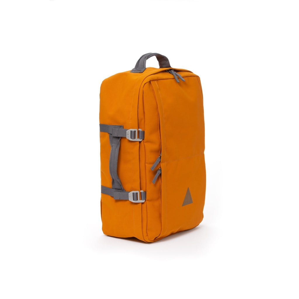 Orange recycled canvas travel backpack with carry handle.