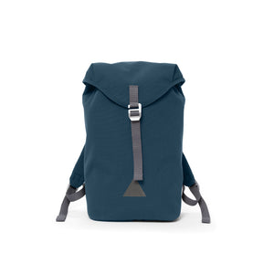 Blue canvas backpack with a flap closure and triangle logo.