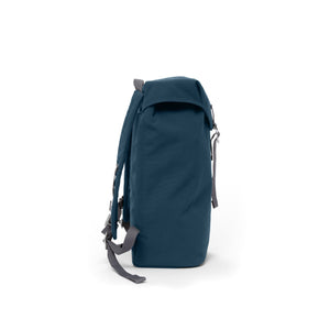 Blue waterproof backpack with flap and metal buckle.